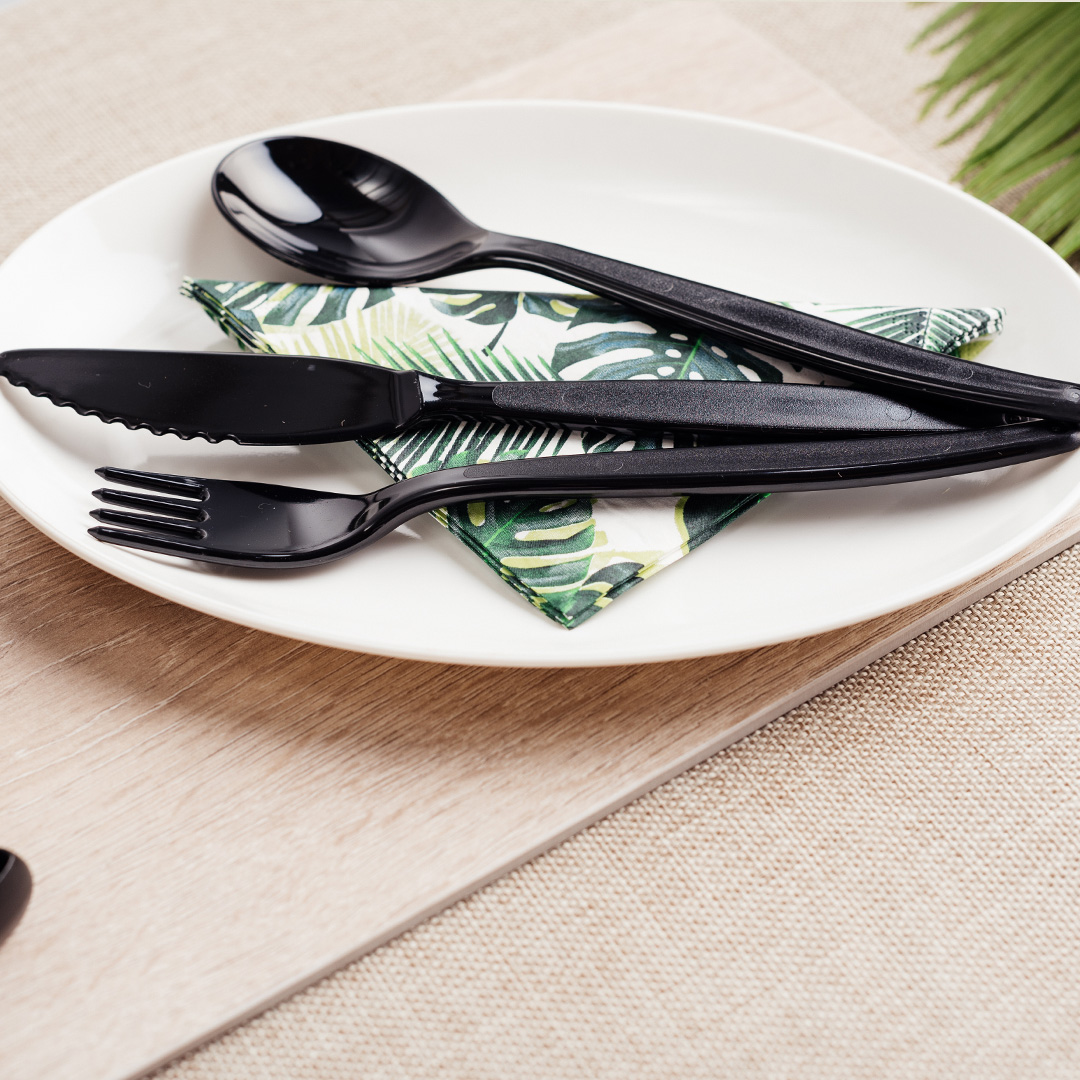 Black Plastic Reusable Cutlery in dining setting