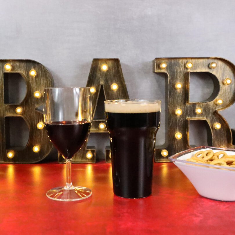 Red Wine Glass and Beer Pint Glass with Snacks