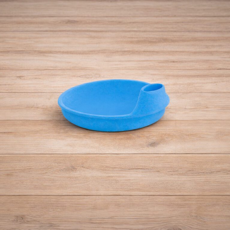 Blue spout on wooden background