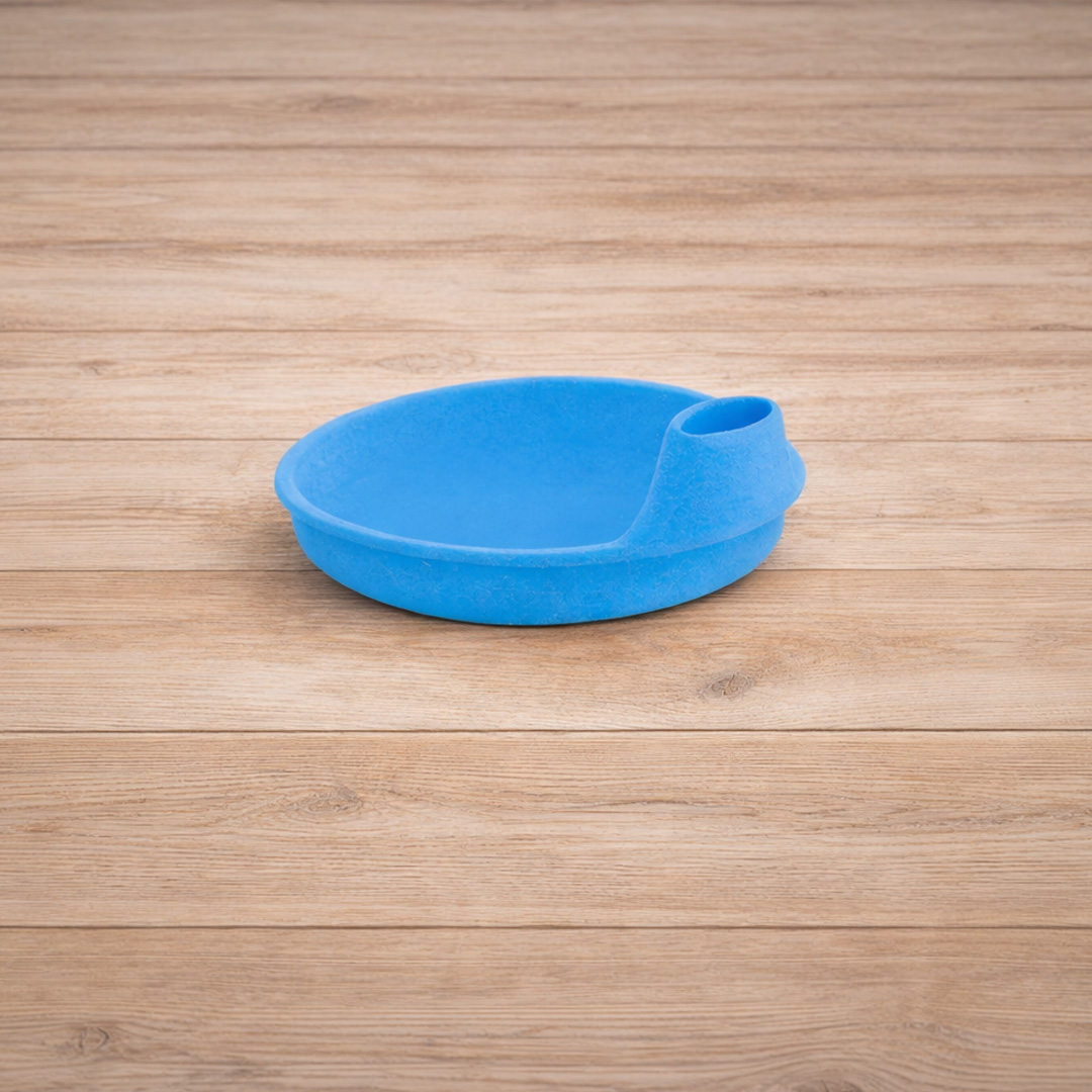 Blue spout on wooden background