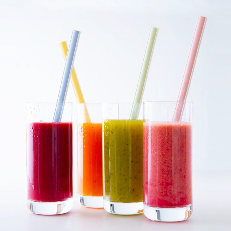 Fruit Smoothies in Cocktail Tumblers with Reusable Plastic Straws