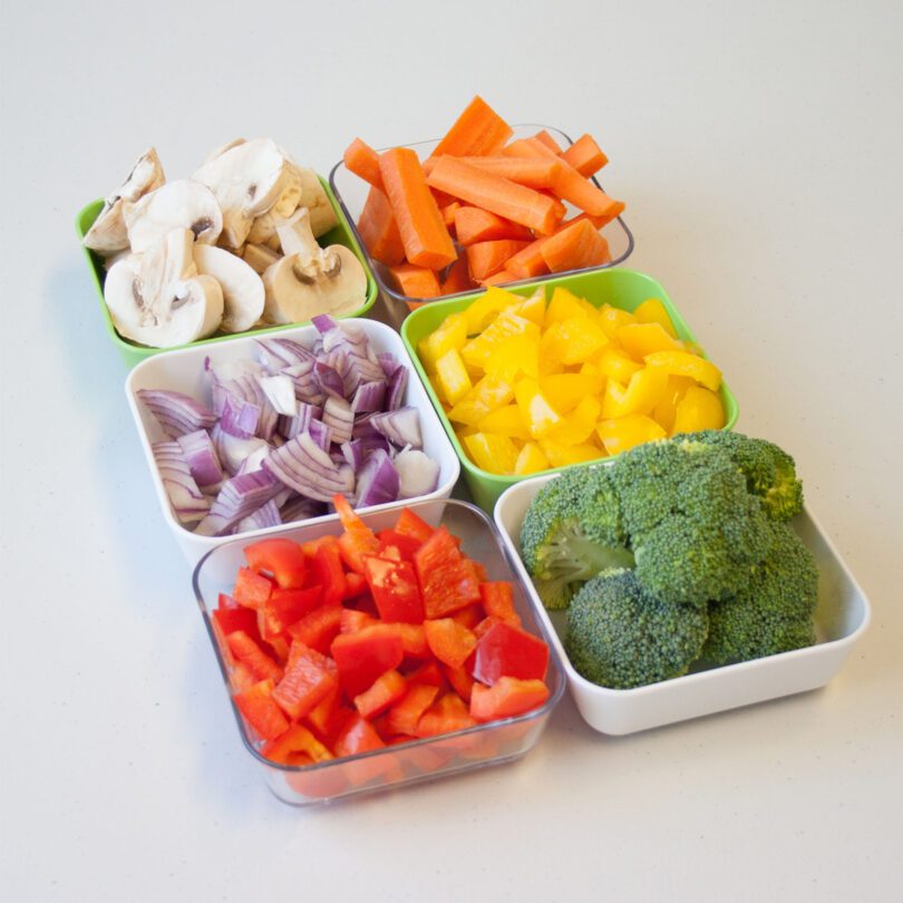 Coloured Ingredient Prep Bowls with portions of fresh vegetables