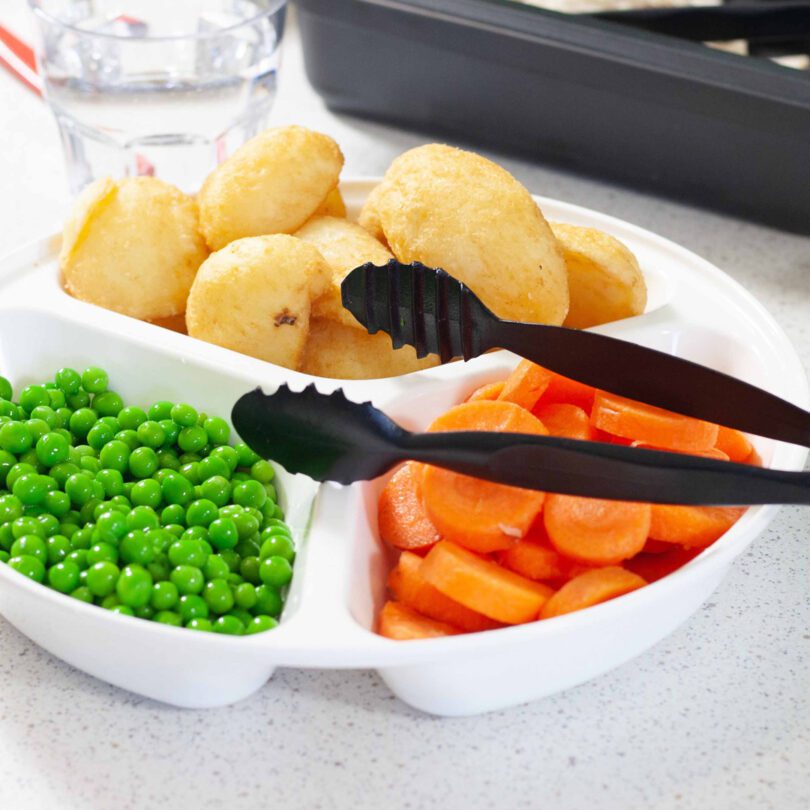 Black Self Service Tongs with Side Dishes