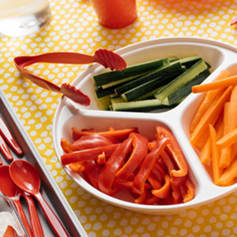 Red Serving Tongs with a sharing platter