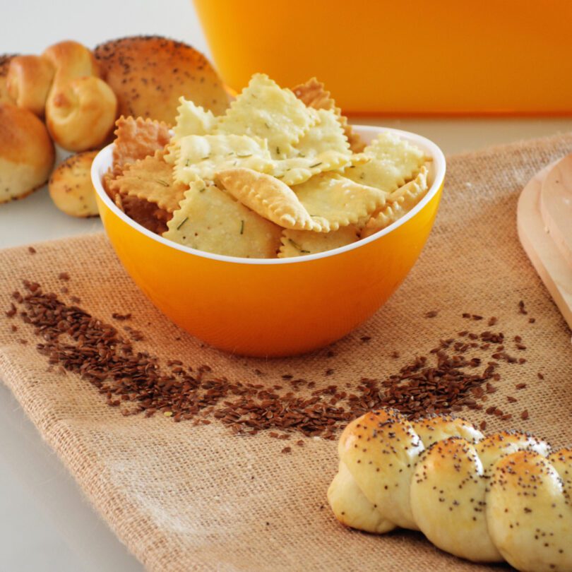 Crackers in Yellow Curved Bowl