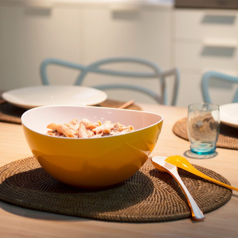 Yellow Curved Serving Bowl with Pasta