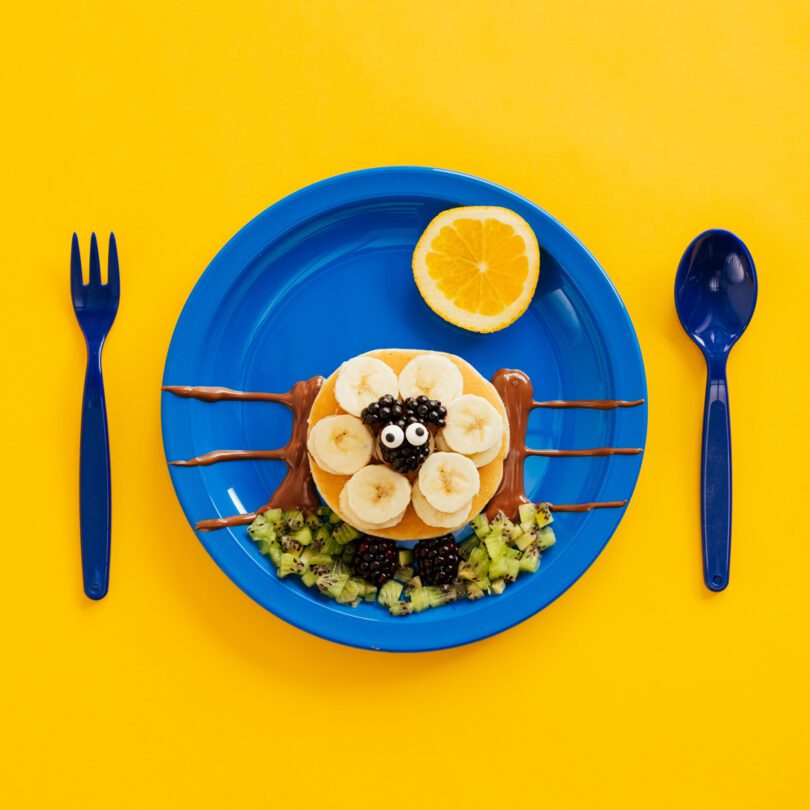 Children's Lunch On Blue Dinner Plate