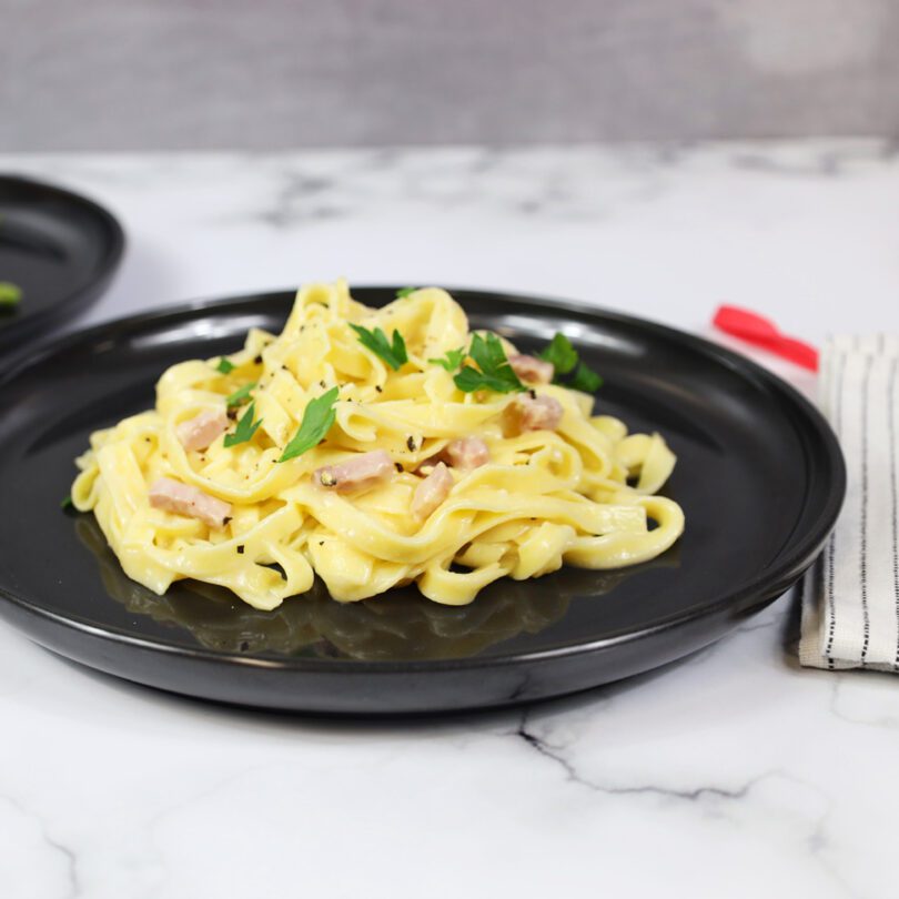 Pasta Dish on Black Walled Plate