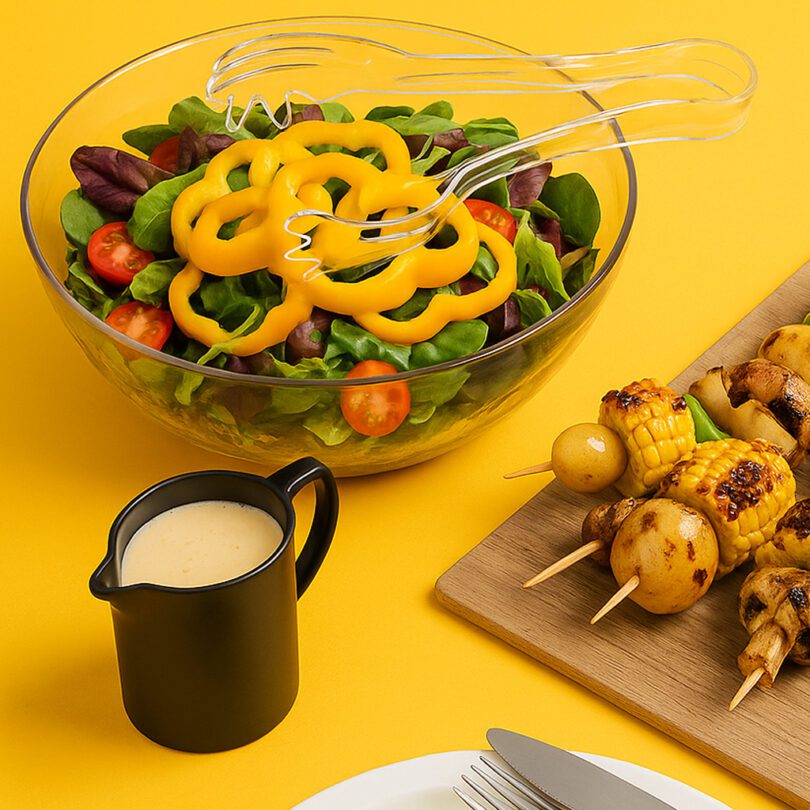 Clear Salad Bowl with Matching Serving Tongs in Use