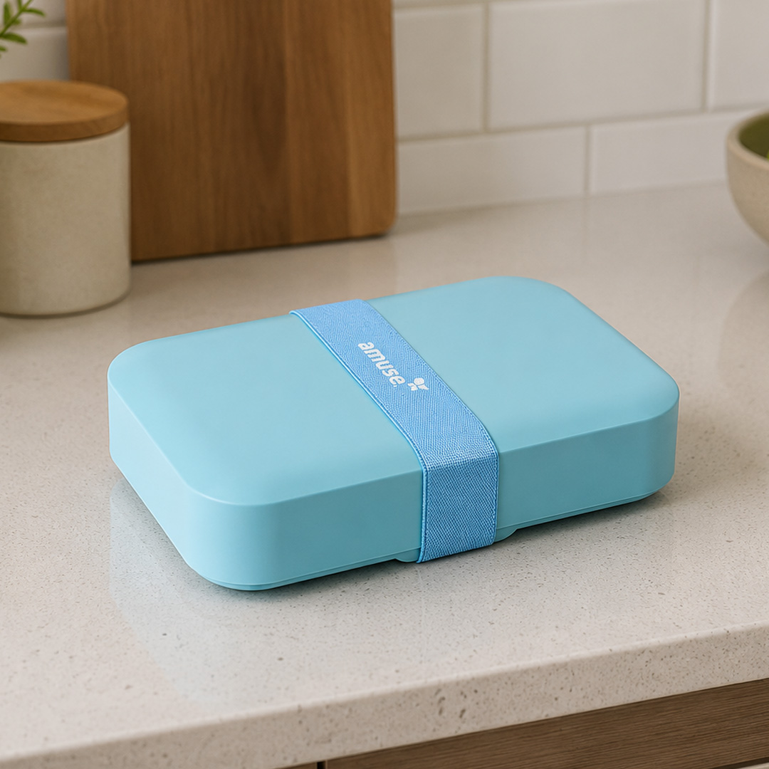 Large BPA FREE blue lunchbox in kitchen setting